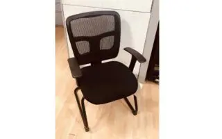 Black mesh-back office chair