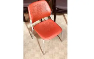 Red office chair with mesh